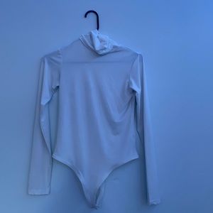 White turtleneck body suit